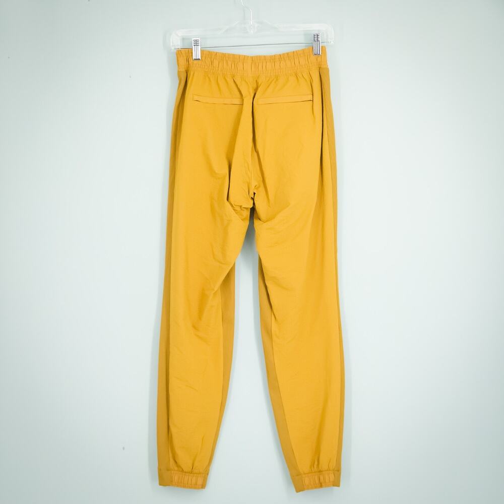 Athleta Size 0 Textured Brooklyn Jogger Mustard Yellow Solid Nylon Active Pants - Picture 3 of 7